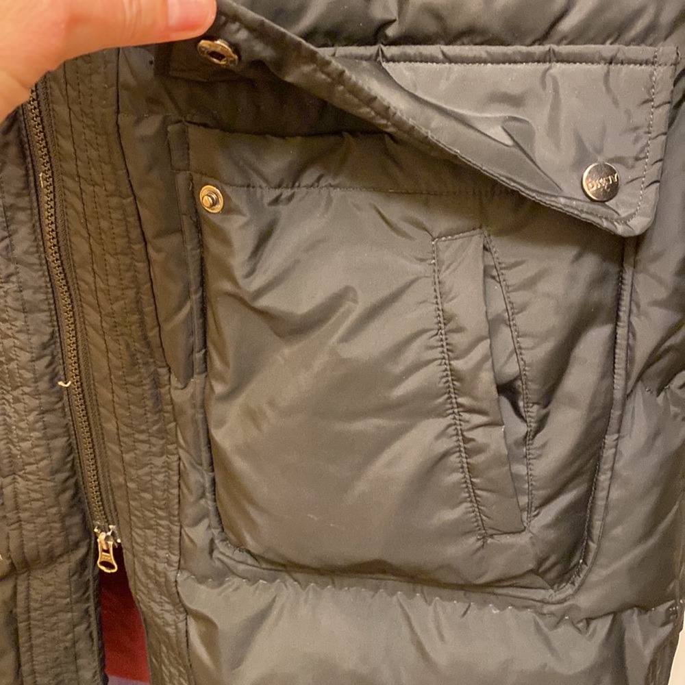 Fabulous DKNY down-filled winter coat with detachable black fur hood.